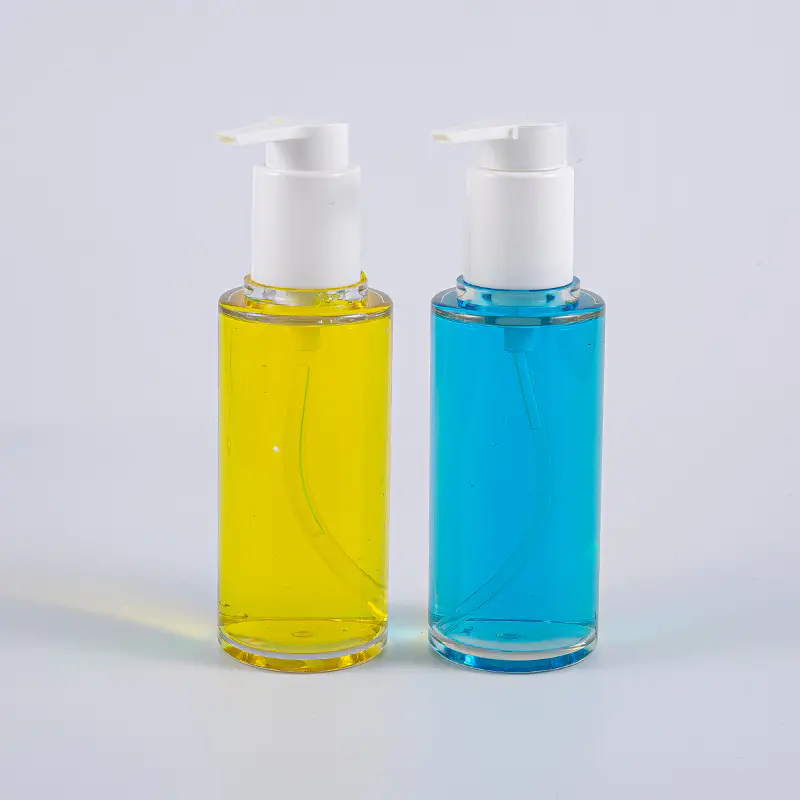Genomskinlig PETG 100 ml rund form lotionflaska med vit plastpump