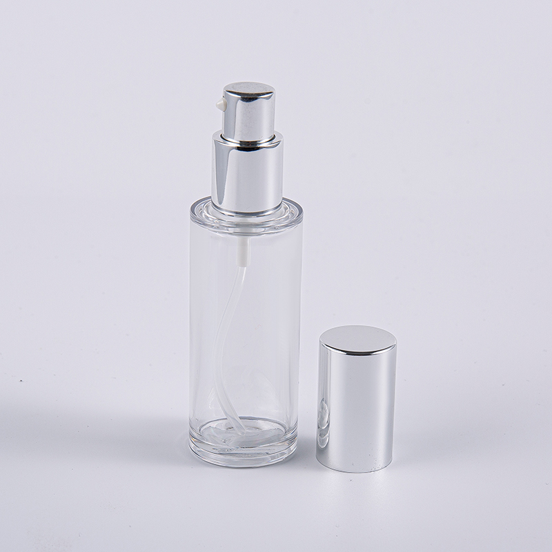 Högkvalitativ 35 ml rund lotionflaska med aluminiumpump Resanvändning